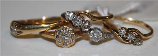 Five diamond-set rings, all in 18ct gold & 18ct gold & platinum settings